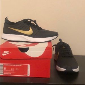 NEW! Nike running shoes - black and gold.